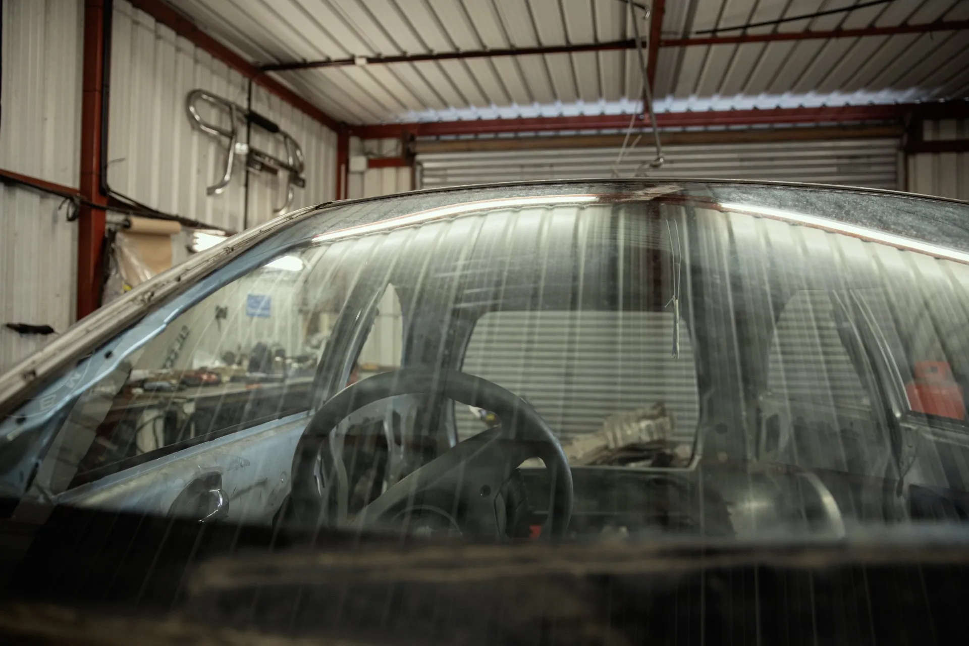 Vehicle in workshop bay