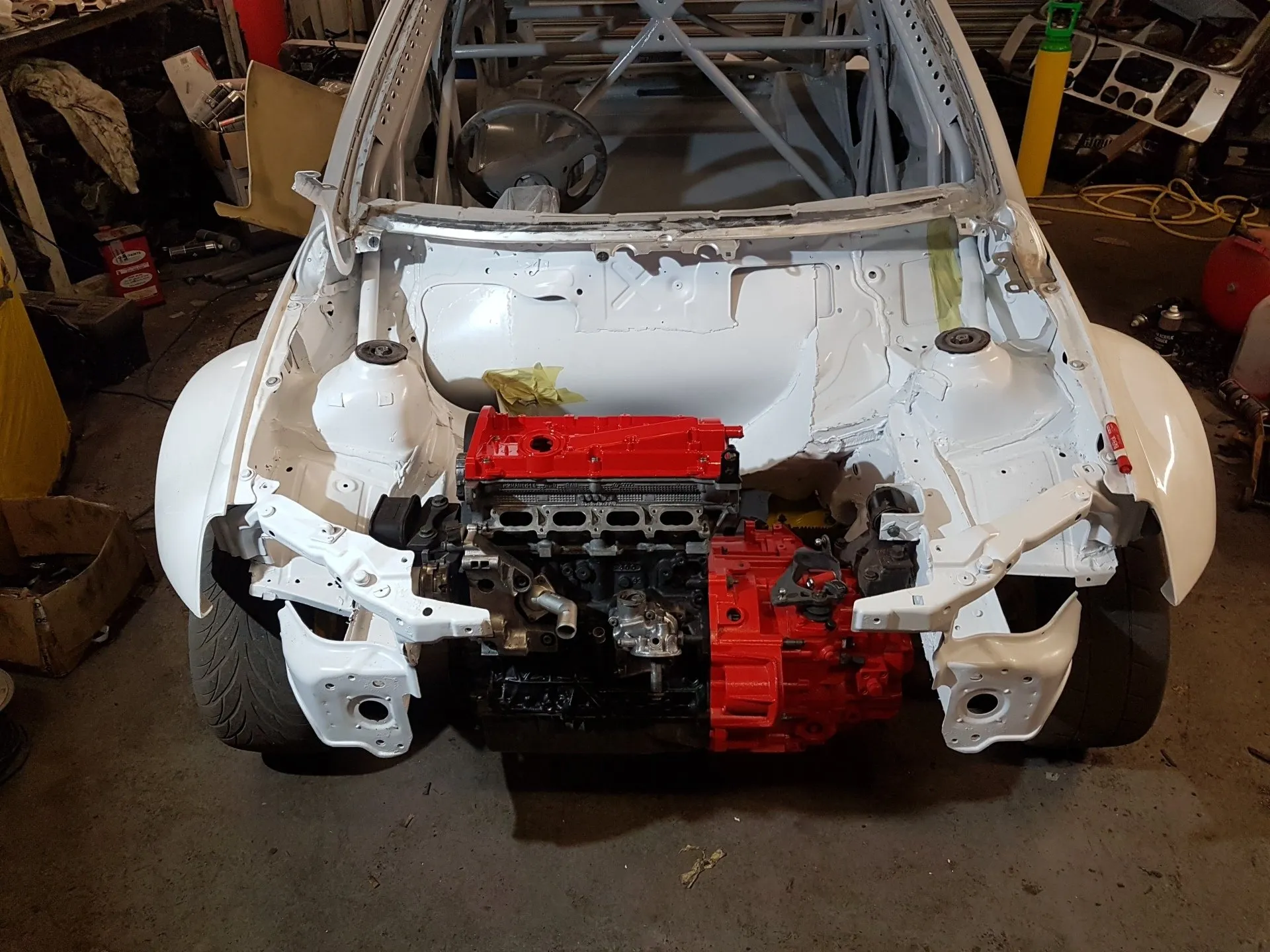 Front end of race build with red engine and gearbox mocked up
